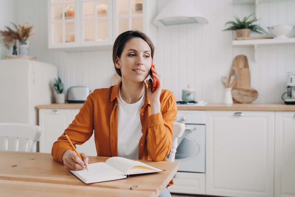 woman on the phone with a company